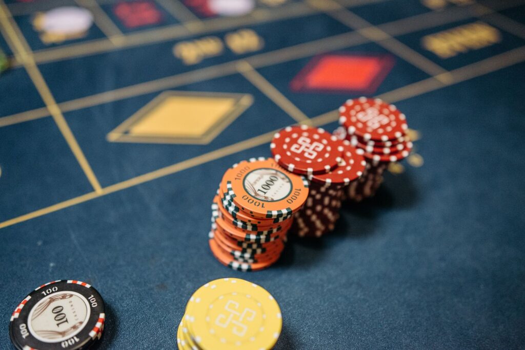 Casino chips on a roulette table for casino comparison cards